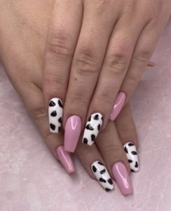 cow and pink nails